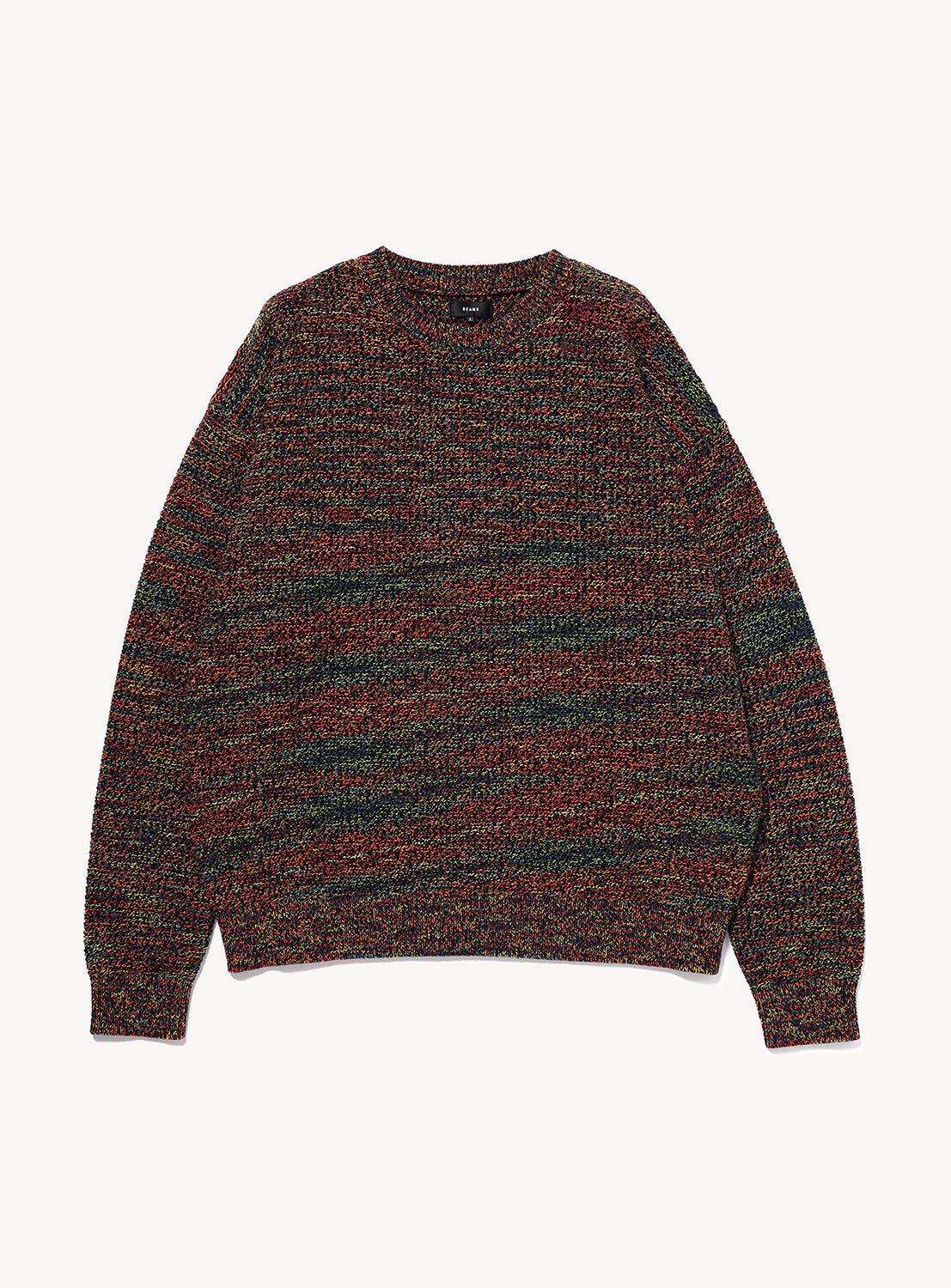 BEAMS 7-Gauge Mesh Crew Neck Top in a relaxed fit with a variegated, gradient mesh knit of red, black, and green yarn.
