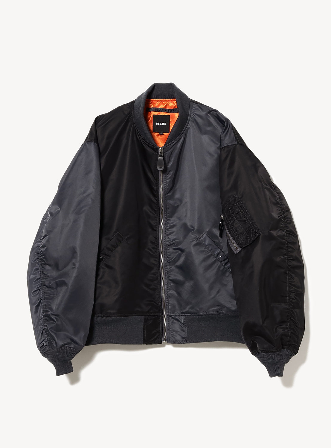 Black Water-Repellent Wide-Fit MA-1 Bomber Jacket flat lay, displaying its durable nylon twill and oversized fit.