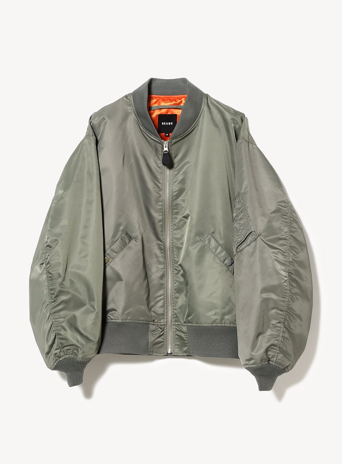 Olive green Water-Repellent Wide-Fit Crazy MA-1 Bomber Jacket flat lay, made from rugged nylon twill, featuring large sleeves and extended hem.