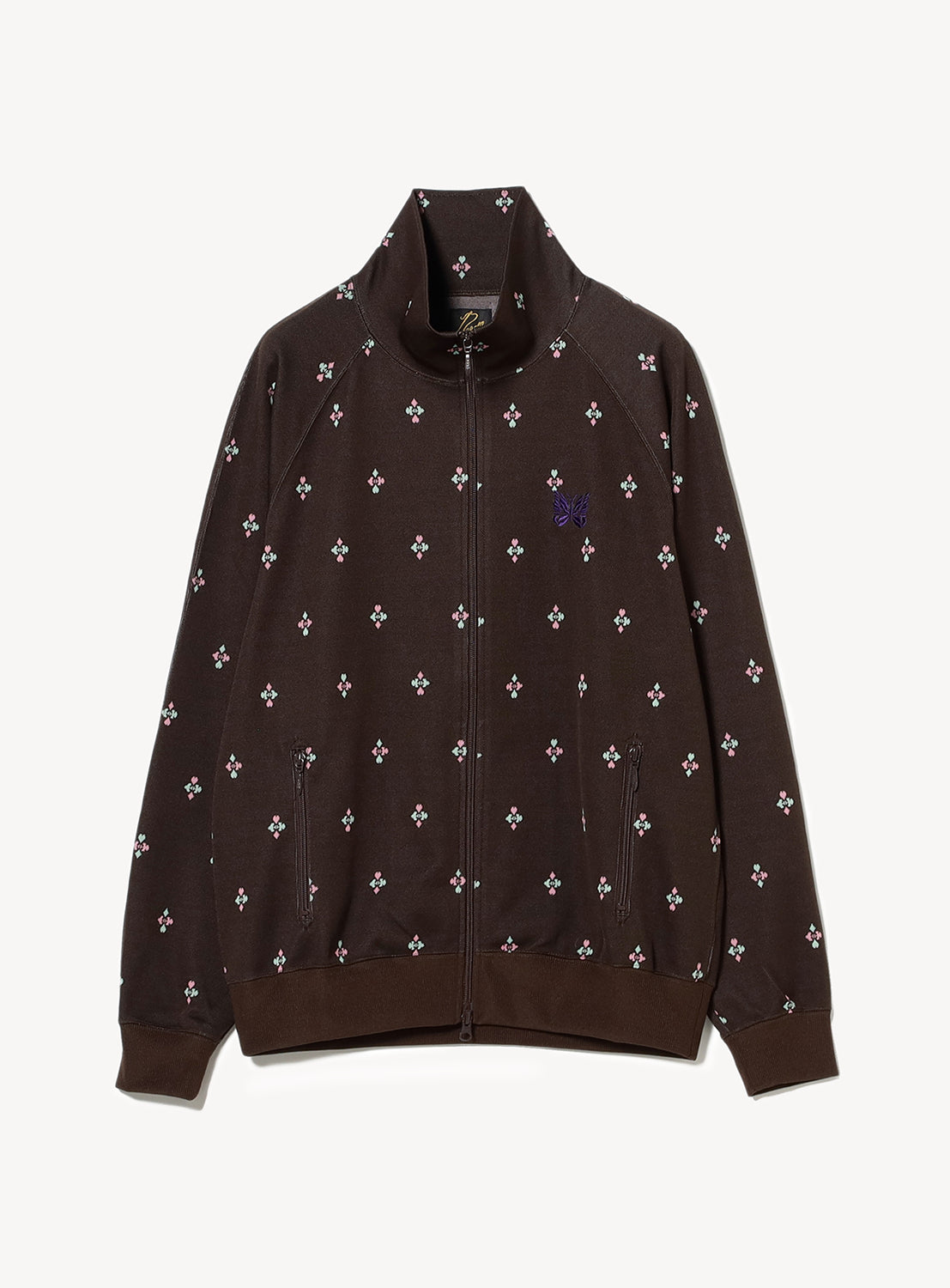 Brown track jacket with a pink and mint floral pattern with zip up pockets and a purple embroidered butterfly.