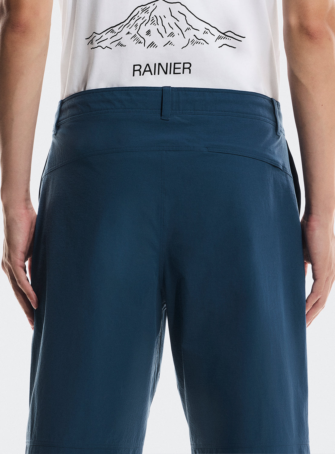 Back of the blue trek pants with belt loops. 