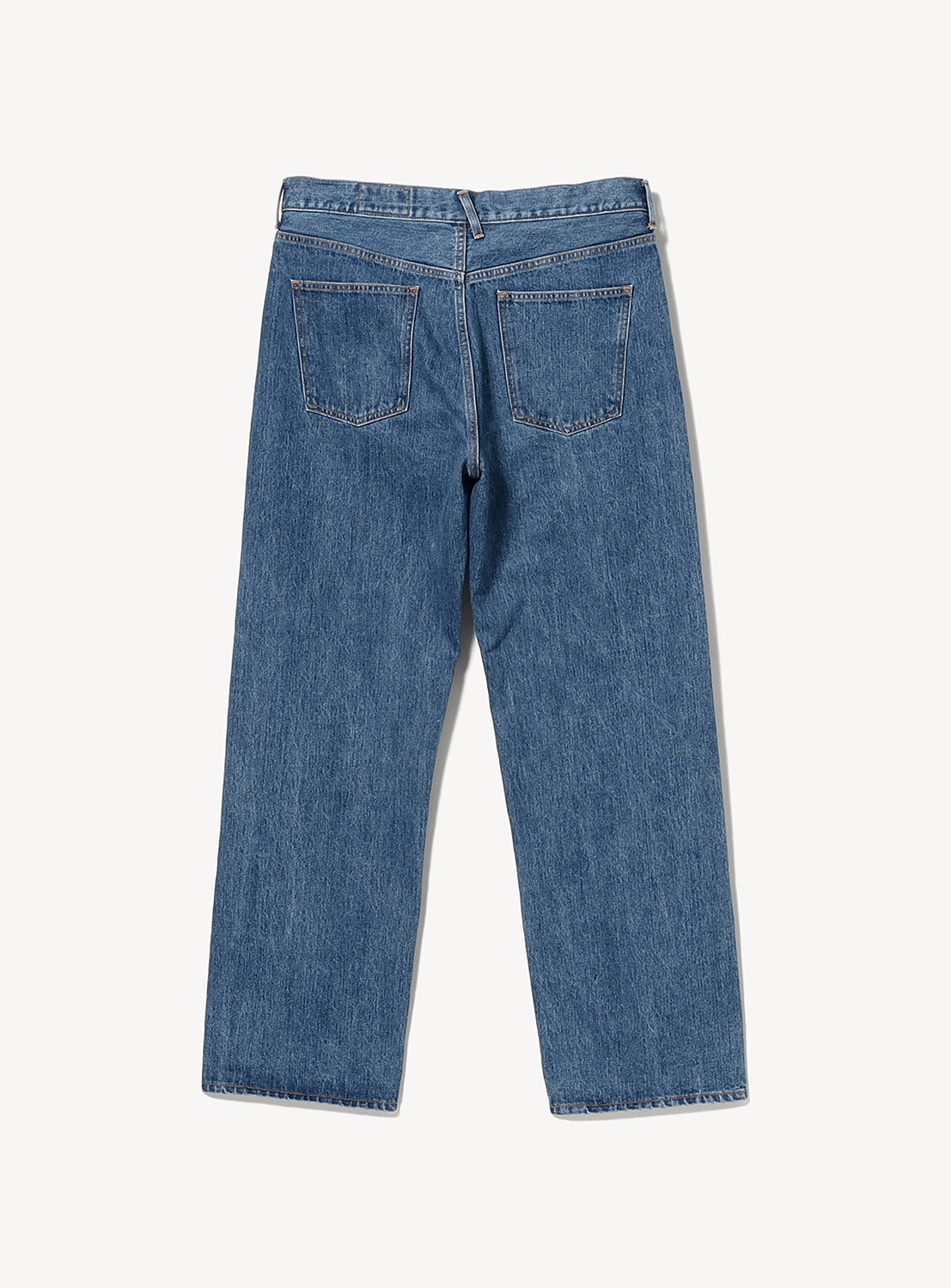 The Bandana Embroidery Denim Pants by NOMARHYTHM TEXTILE, crafted in Japan from premium Okayama denim, are laid flat and displayed from the back. These jeans feature two back pockets, belt loops, and a straight leg cut, set against a plain white background.