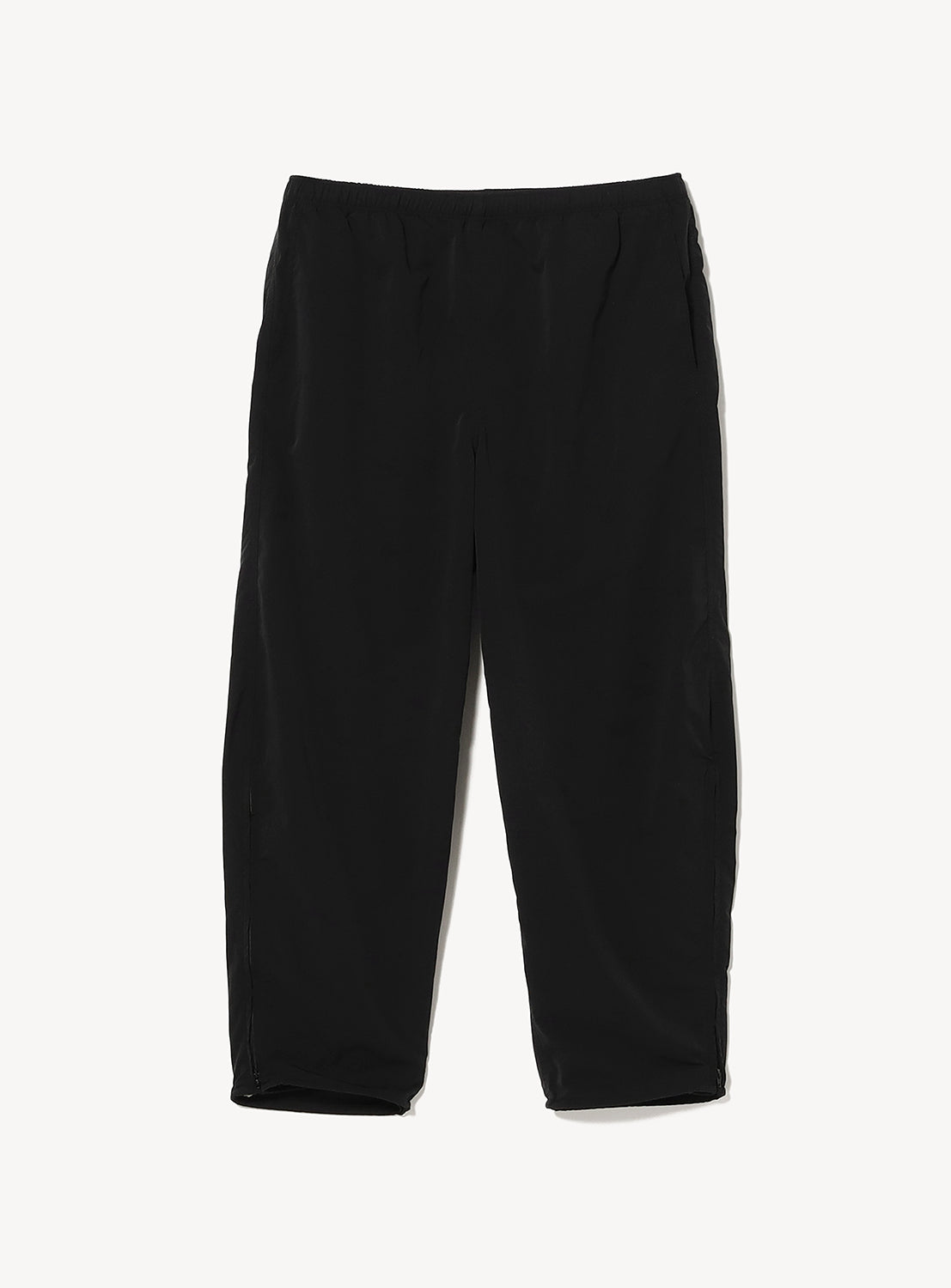 Black BEAMS Technical 2-Way Adjustable Easy Pants in stretch double-weave fabric featuring a wide, straight leg, elastic waistband, and zippers at the lower hems.