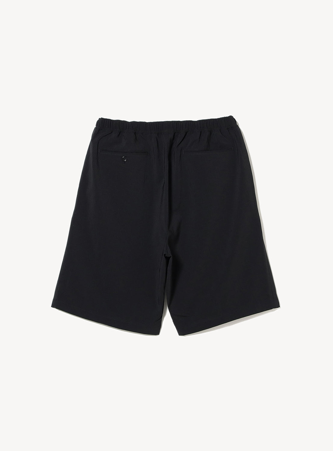 Top-down view of black elastic-waist shorts, highlighting the comfortable waistband and clean silhouette.