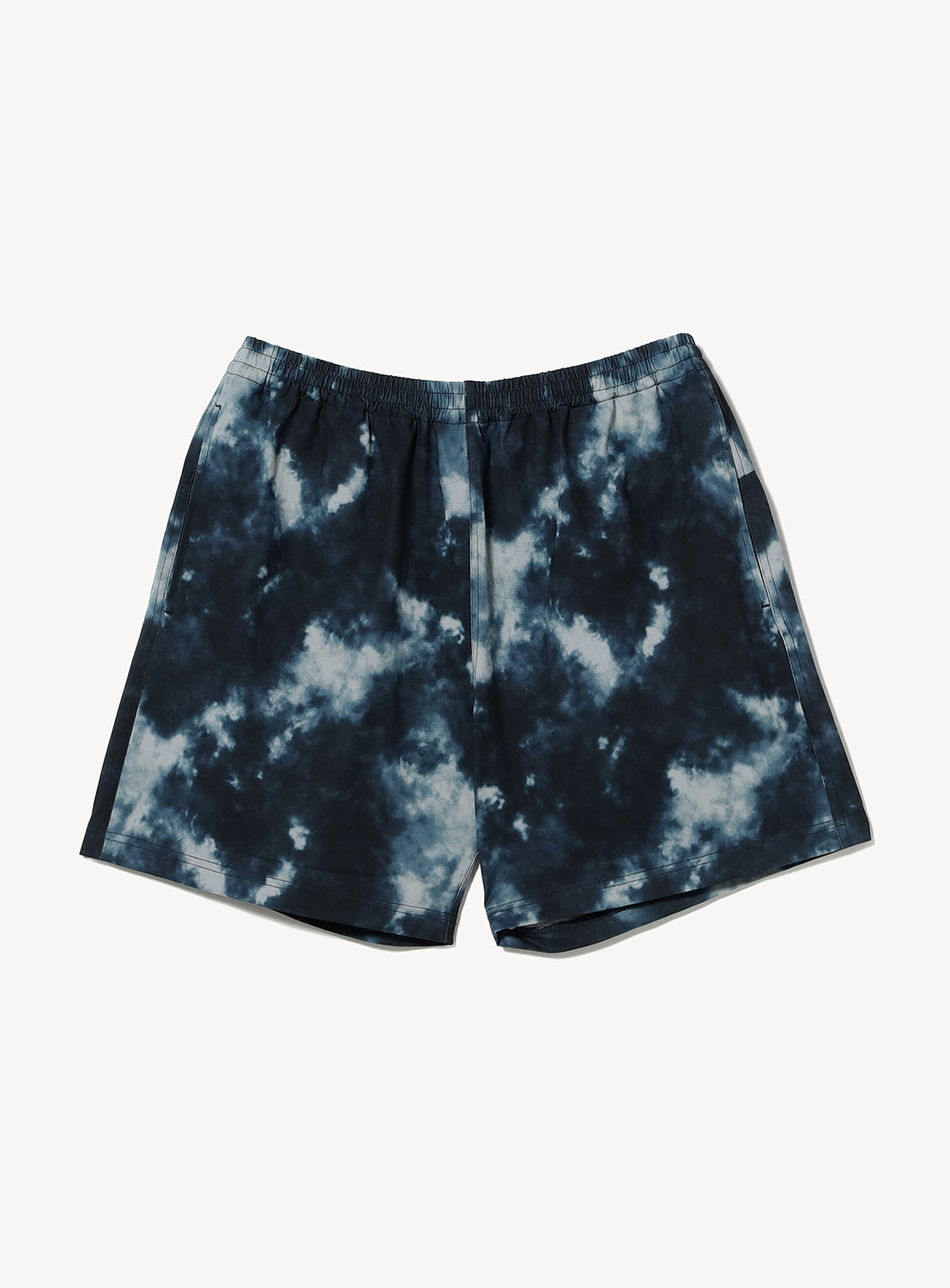 BEAMS Wide Fit Dynamic Dry Shorts in blue and white tie-dye, featuring an elastic waistband and crafted from quick-drying, UV-protective fabric, displayed flat on a white background.