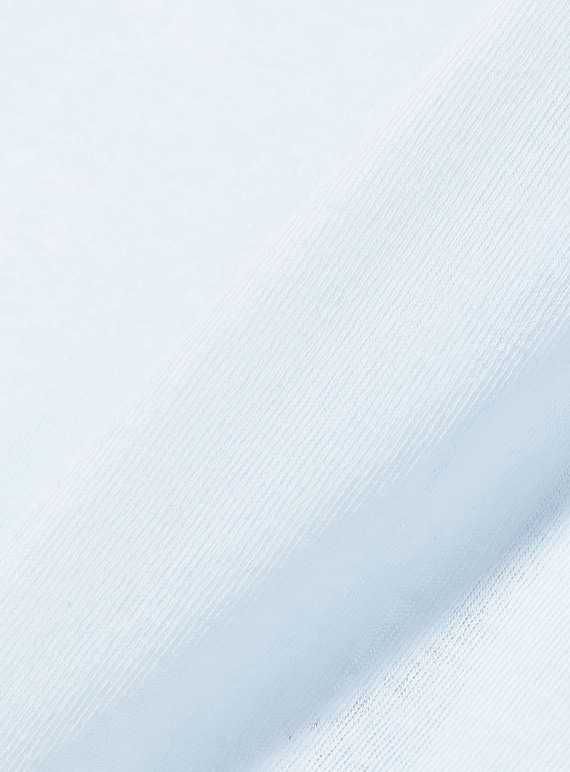 Close-up of a smooth, light blue fabric with a visible weave pattern and a soft diagonal fold running across the image, ideal for crafting the Ernie Palo Sheer V-Neck Cardigan—a lightweight piece with a sheer finish.