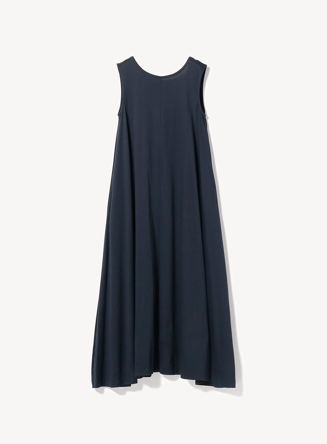 THE BASIC Maxi Dress in navy blue, featuring a sleeveless design, loose fit, round neckline, and flared silhouette, showcased against a plain white background.