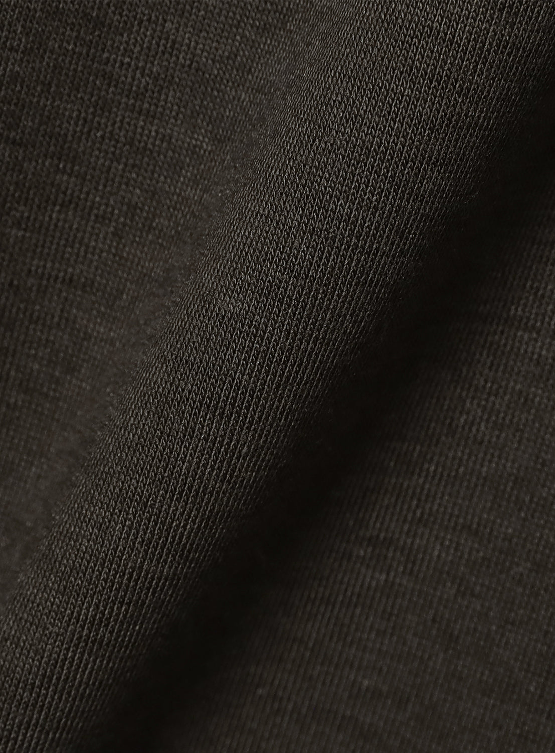 Close-up of the grey fabric, highlighting the quality and subtle texture of the material.