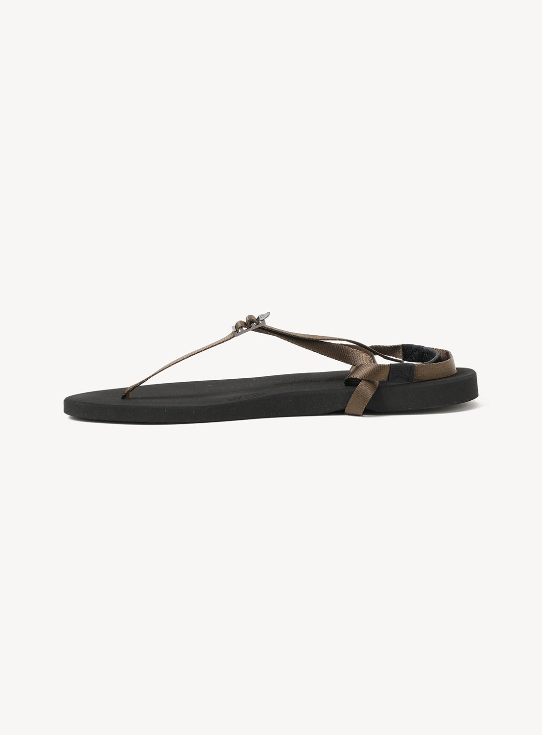 The BEAUTIFUL SHOES Minimalist Huarache Barefoot Sandals feature a flat black sole and thin brown straps, including a toe loop and an adjustable back strap, capturing a barefoot-inspired minimalist silhouette. The sandals are displayed on a white background.