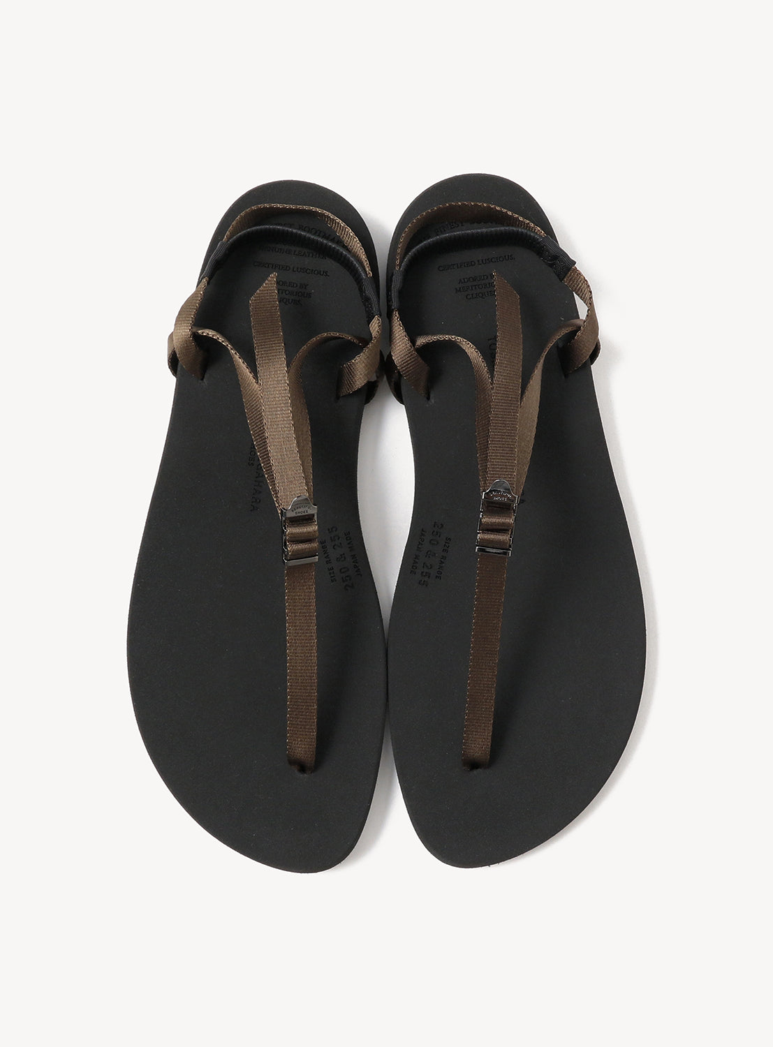 A pair of BEAUTIFUL SHOES Minimalist Huarache Barefoot Sandals with black soles and dark brown straps are laid side by side on a white background, highlighting their minimalist silhouette.