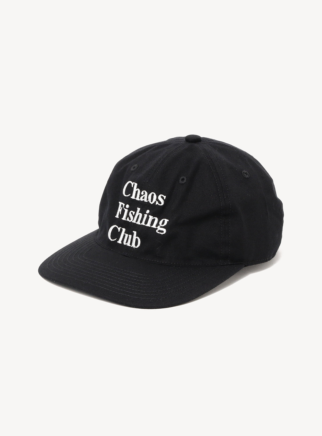 The Chaos Fishing Club Logo Cap by Chaos Fishing Club is a black baseball cap featuring the brand’s signature logo embroidered in white on the front, with an adjustable strap at the back. It is displayed against a white background.