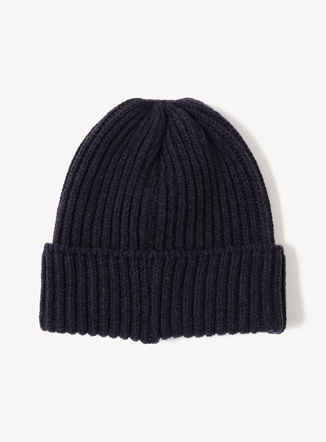 Dark navy NEEDLES Shetland Wool Watch Cap with a ribbed knit, folded cuff, and embroidered papillon.