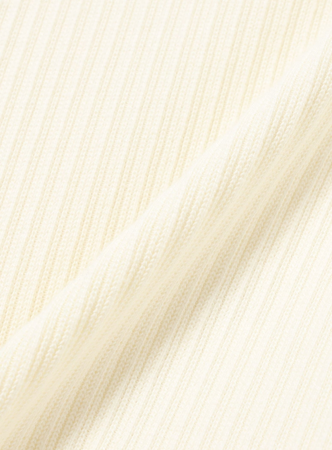 Cream-colored BEAMS Henley Neck Long-Sleeve T-shirt with a ribbed texture and buttoned neckline.