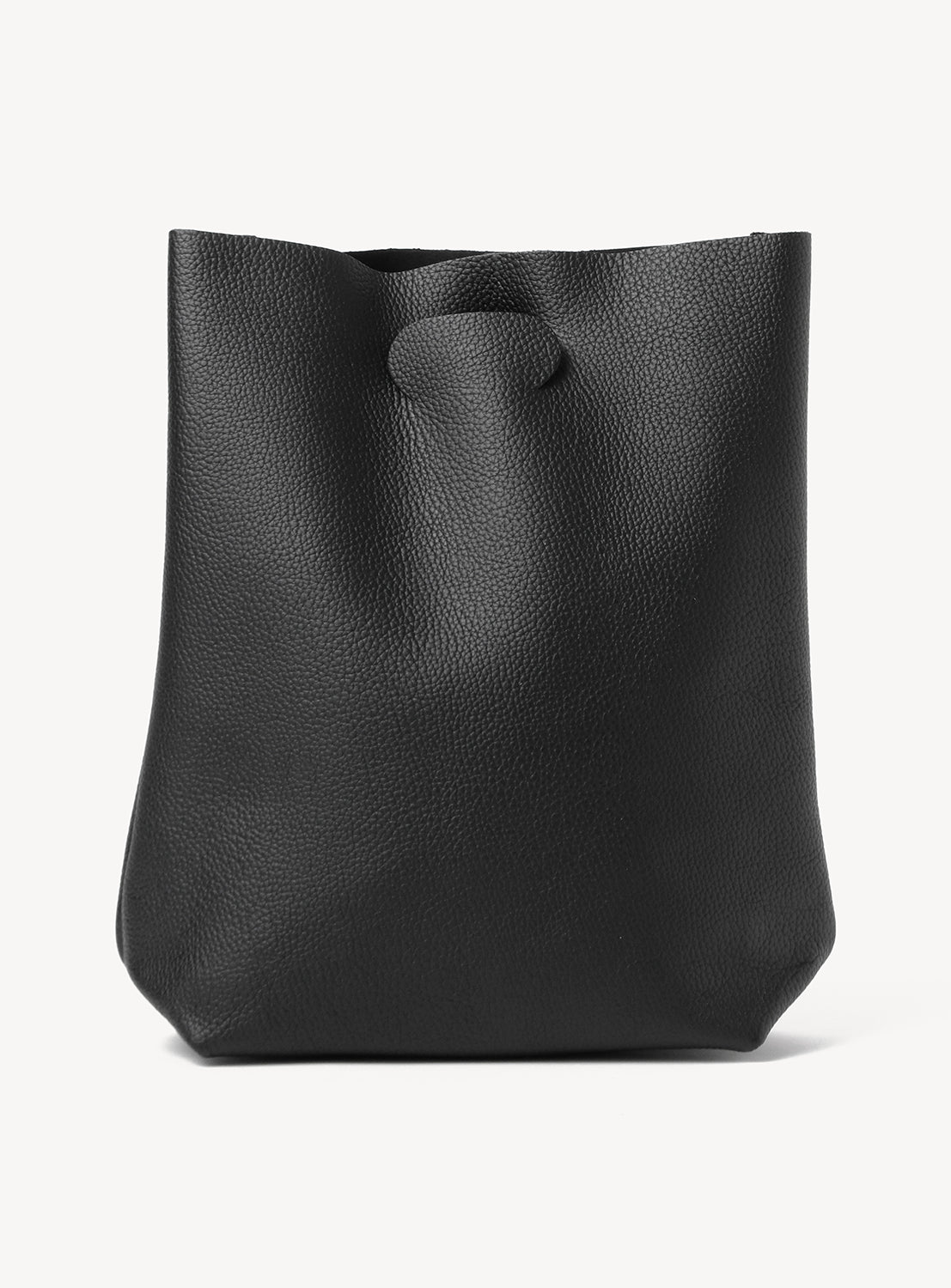 A minimalist black leather Hender Scheme Not Eco Big Bag with a folded tab closure at the top center.