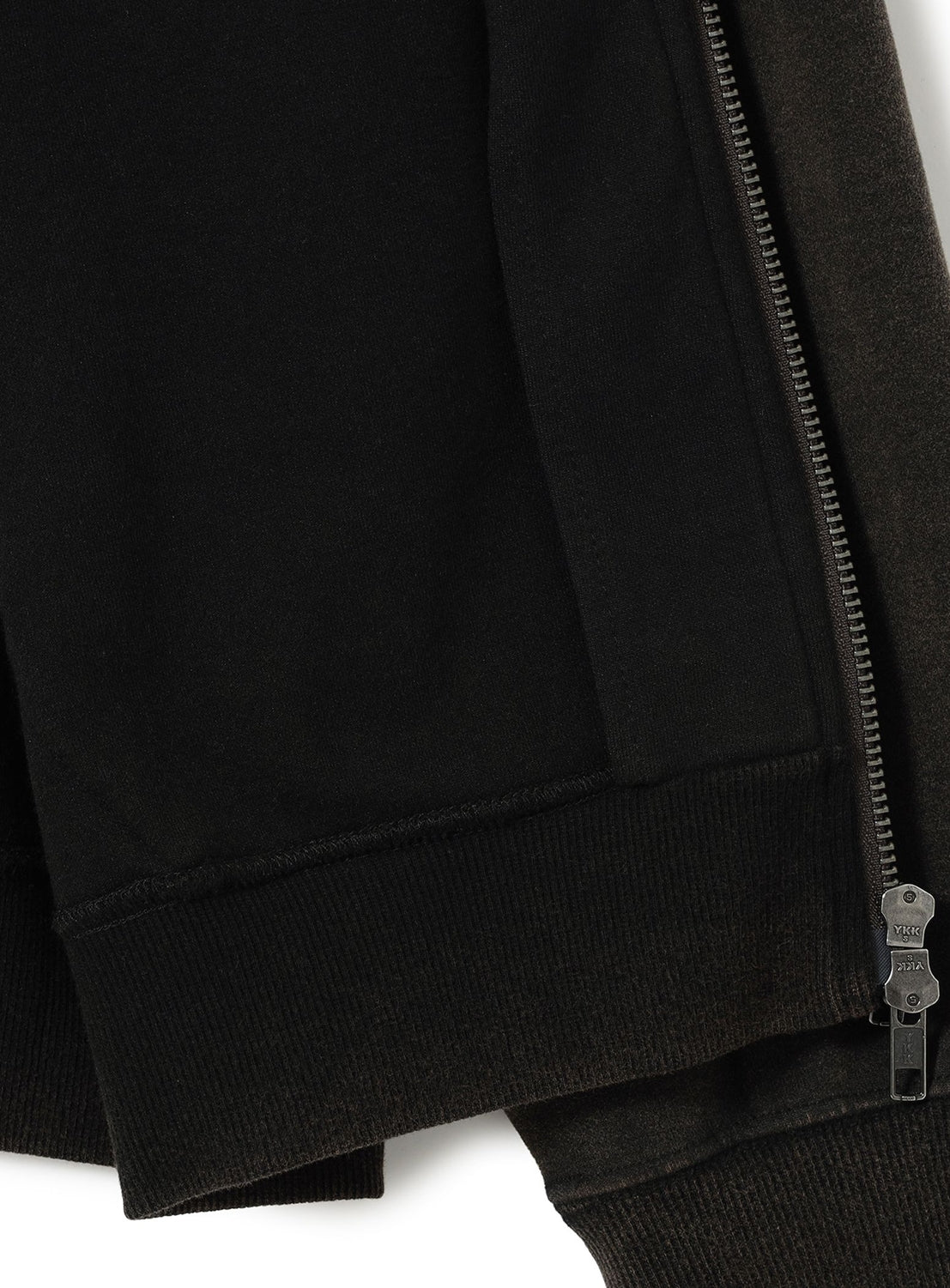 Close-up of a vintage-washed BEAMS Faded Full-Zip Hoodie, showing the ribbed hem, pocket, and zipper detail.