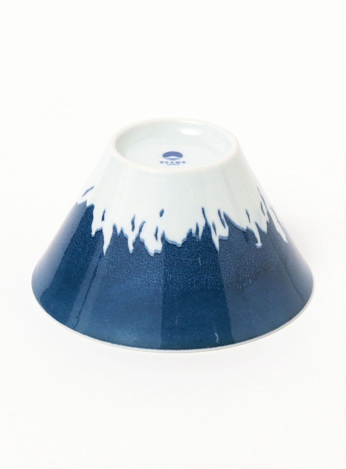Blue and white ceramic bowl on a white background