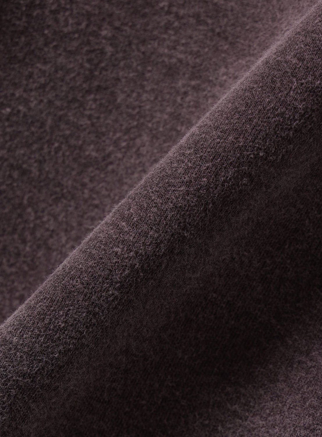 Close-up of a BEAMS Faded Full-Zip Hoodie in vintage-washed dark brown with a soft, brushed texture.