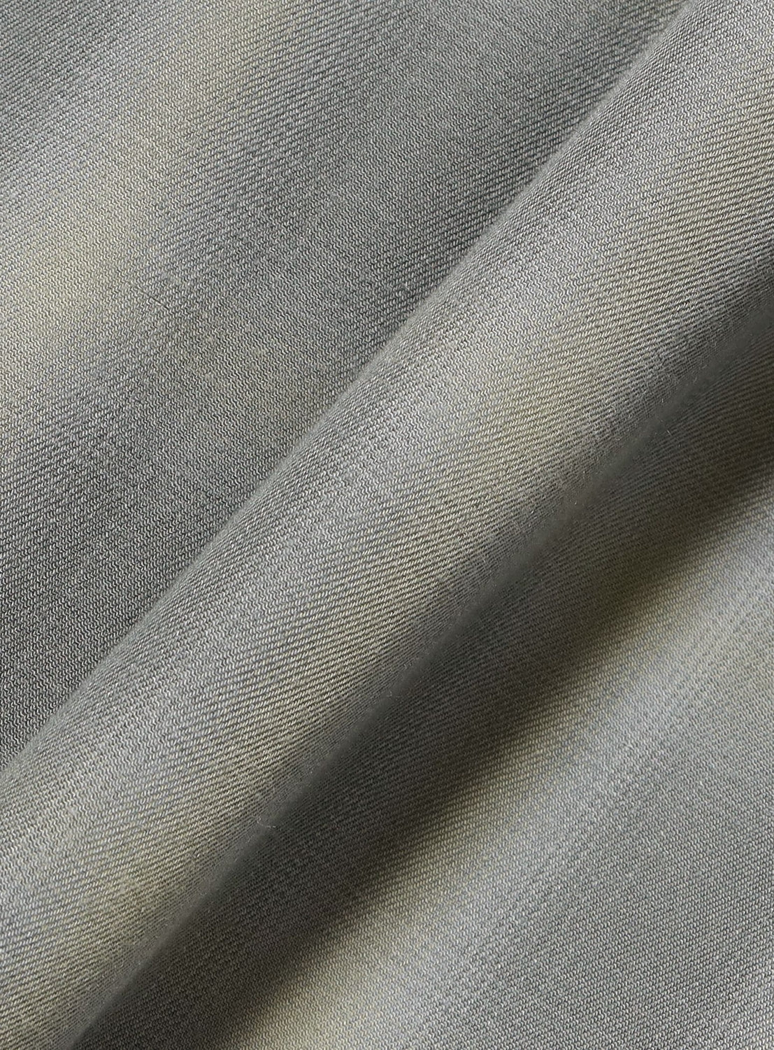 Close-up of a BEAMS Layered Check Shirt in a gray check pattern, shown in a diagonal fold.