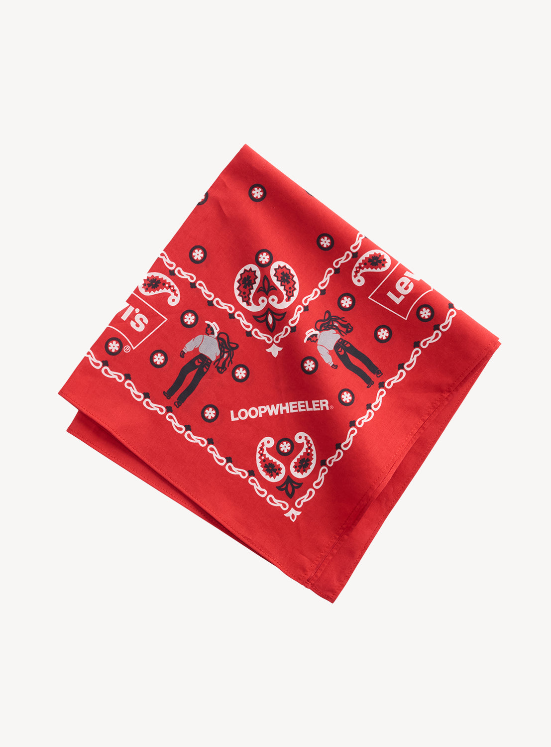 Levi’s® x BEAMS x Loopwheeler red bandana with black paisley and western figure patterns.