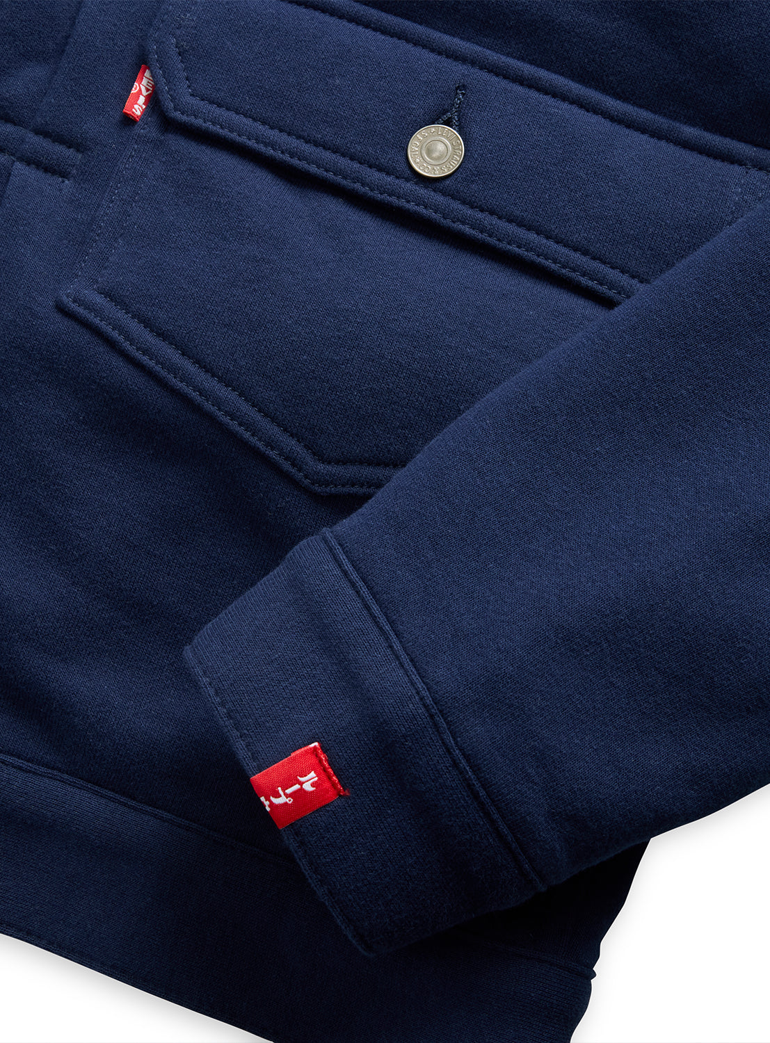 Levi’s® x BEAMS x Loopwheeler Superwide dark blue jacket with chest pocket, buttons, and red tags.