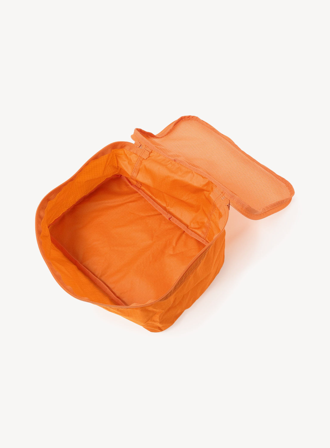 Orange backpack on a white background