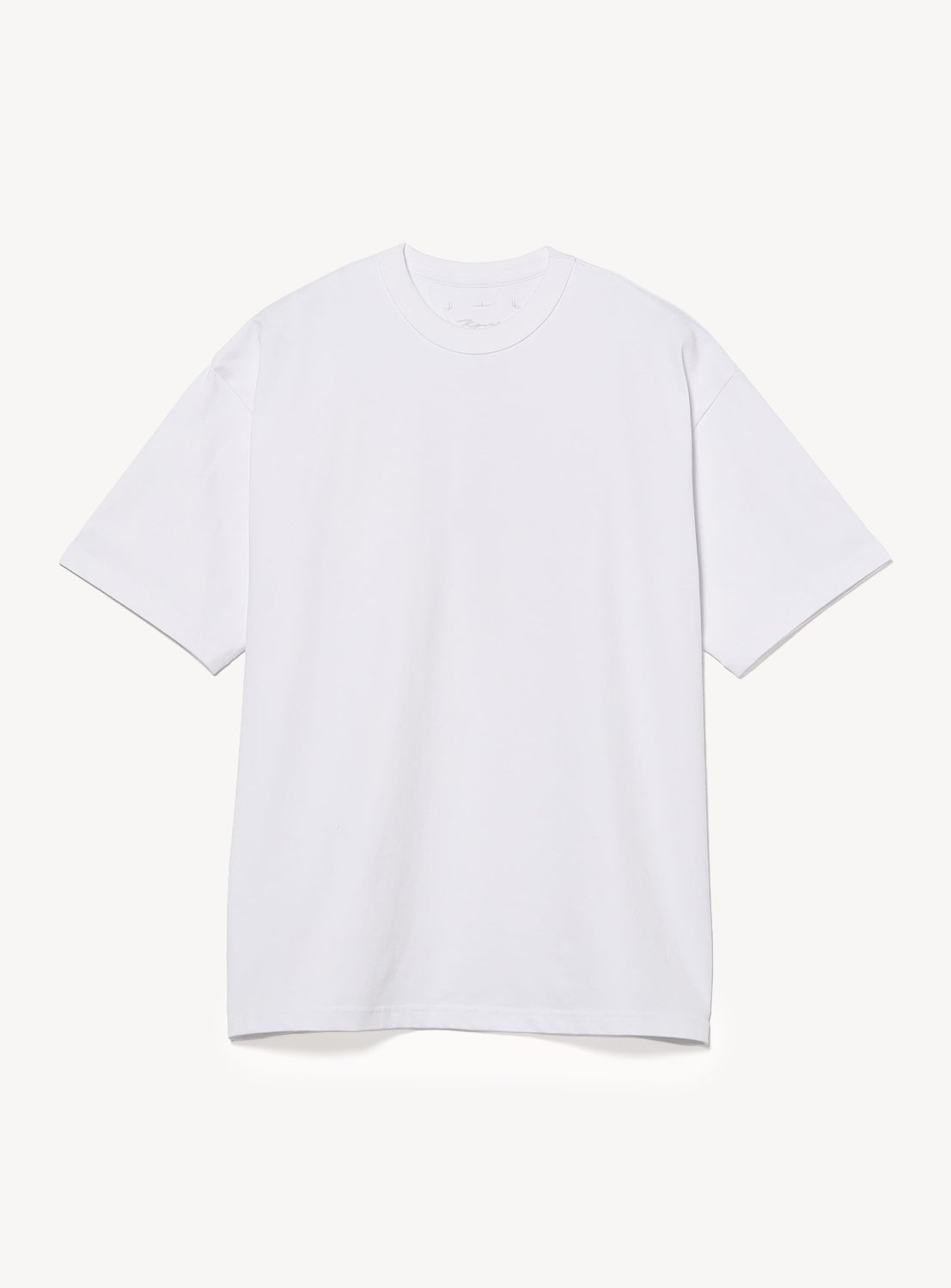 The KYNE T-shirt by BEAMS T is a plain white, short-sleeved, crew-neck top made from heavyweight jersey, shown laid flat on a white background. It features a relaxed, oversized fit with no visible logos or designs.