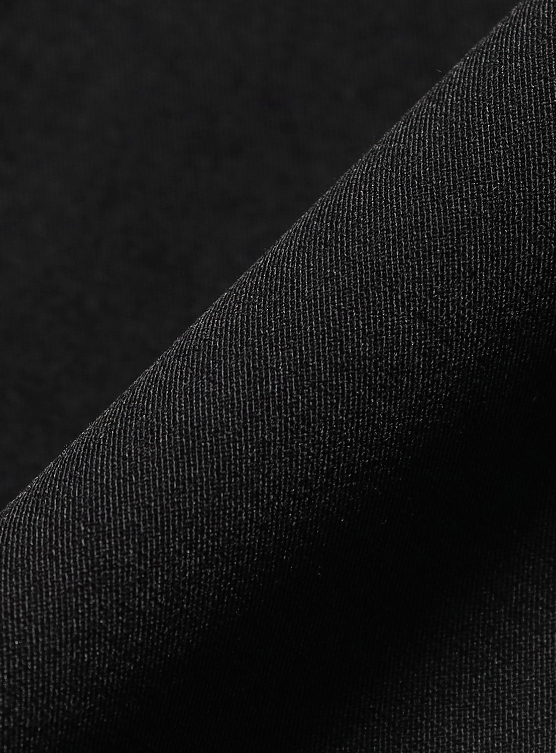 Close-up of a black BEAMS Tech short sleeve shirt in fine-weave technical fabric.