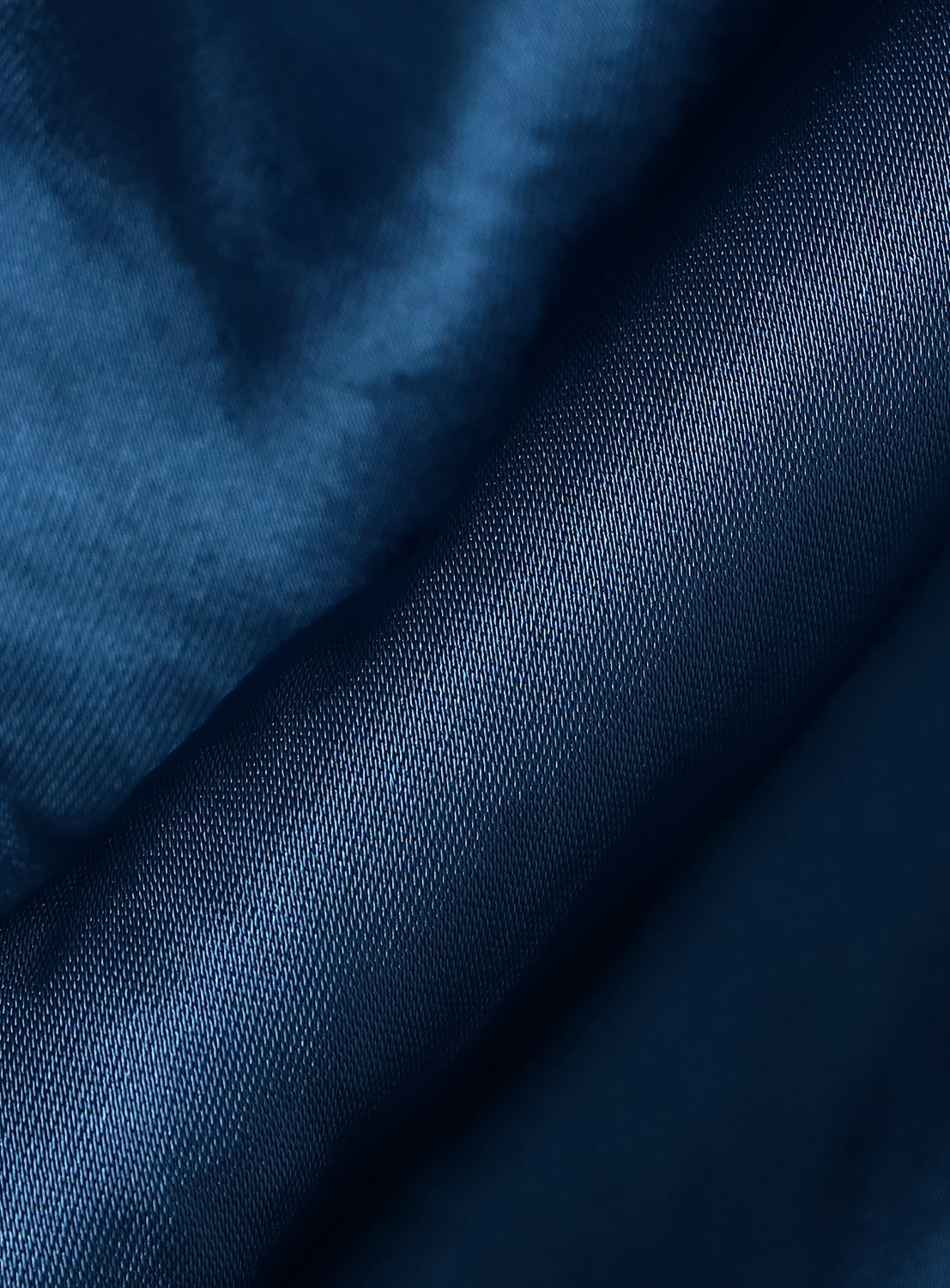 Close-up of shiny blue acetate fabric from the TAILOR TOYO Late 1940s Style Acetate Souvenir Jacket KOSHO & CO. Special Edition “EAGLE & DRAGON” × “JAPAN MAP,” showing rich texture and reflective highlights.