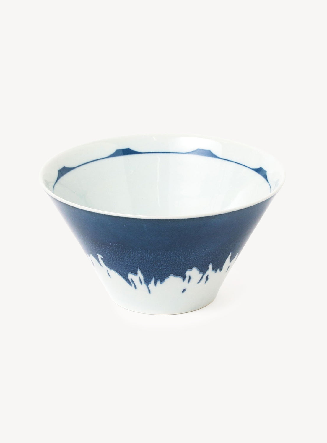 Blue and white ceramic bowl on a white background