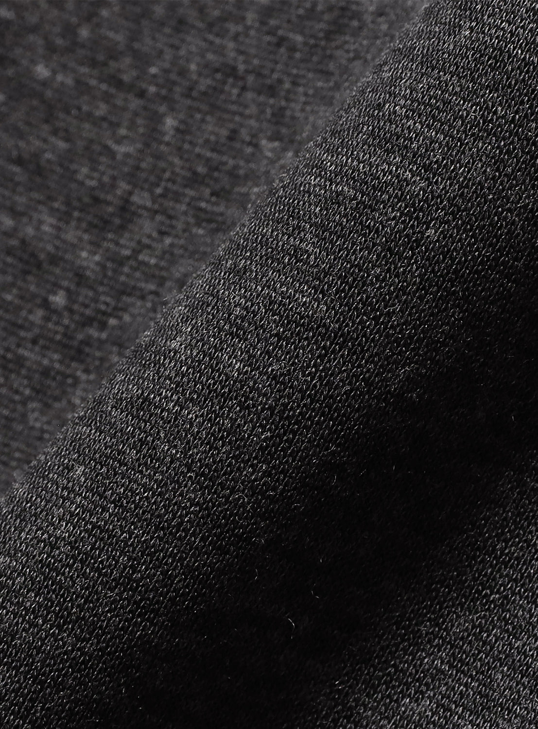 Close-up of dark gray fabric texture.