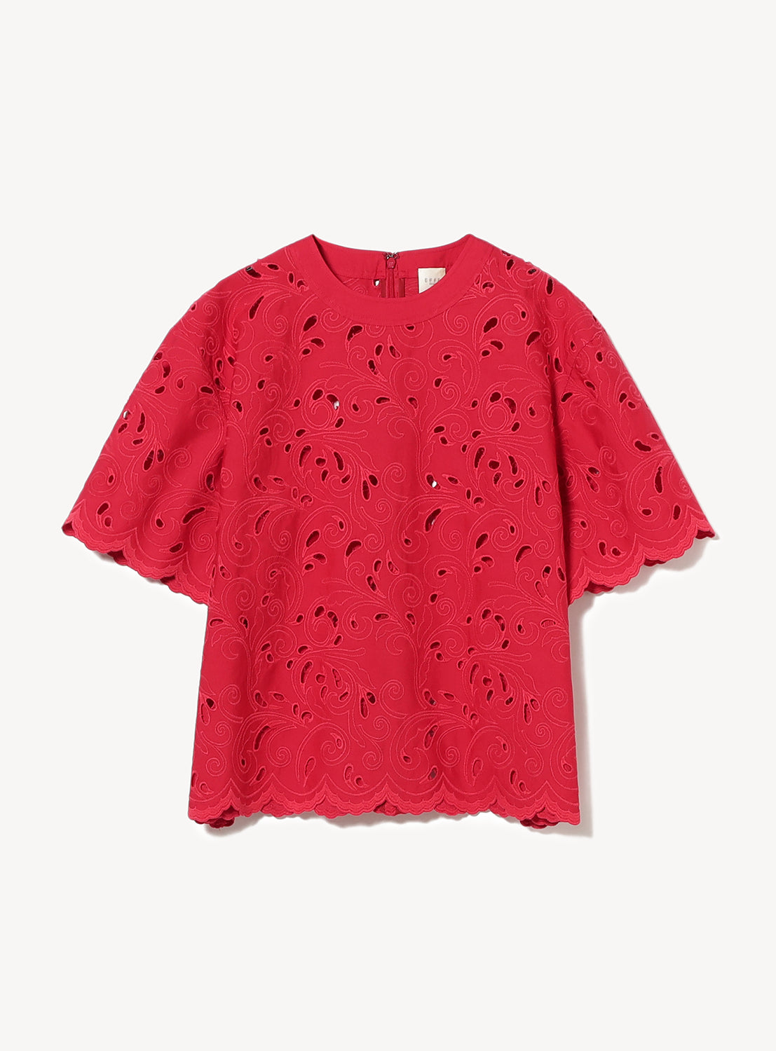 Red boxy-fit blouse from EFFE BEAMS with delicate leaf-patterned cutwork embroidery.