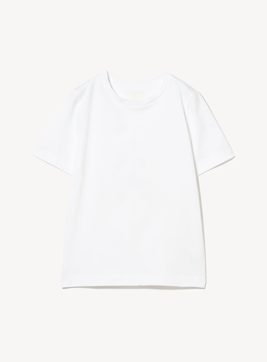 Flat lay of a white tee, highlighting the simple style and round neckline.