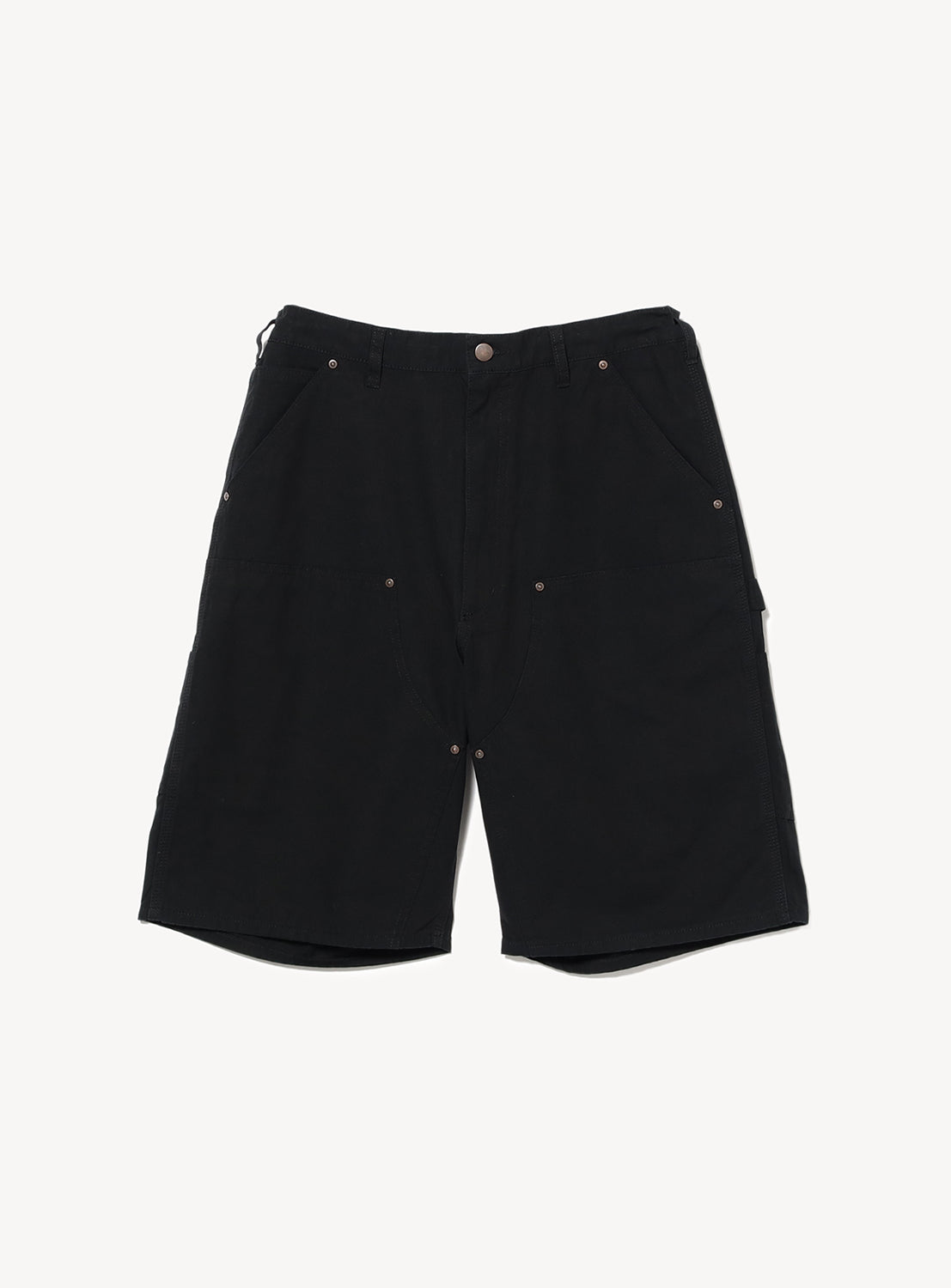Black shorts with workwear-style pockets and silver rivets.