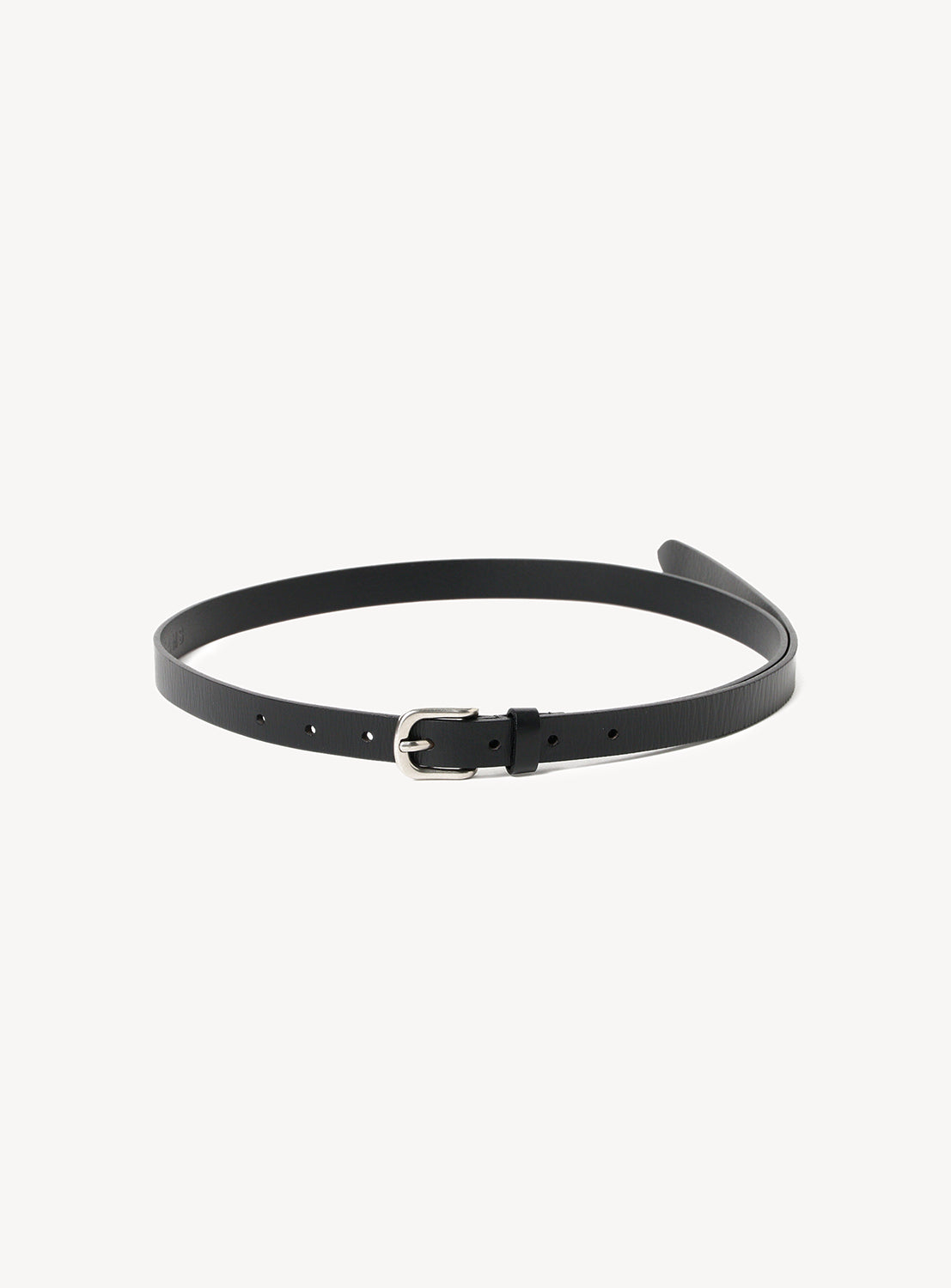 Black leather belt with a silver buckle, presented in a clean, circular lay.