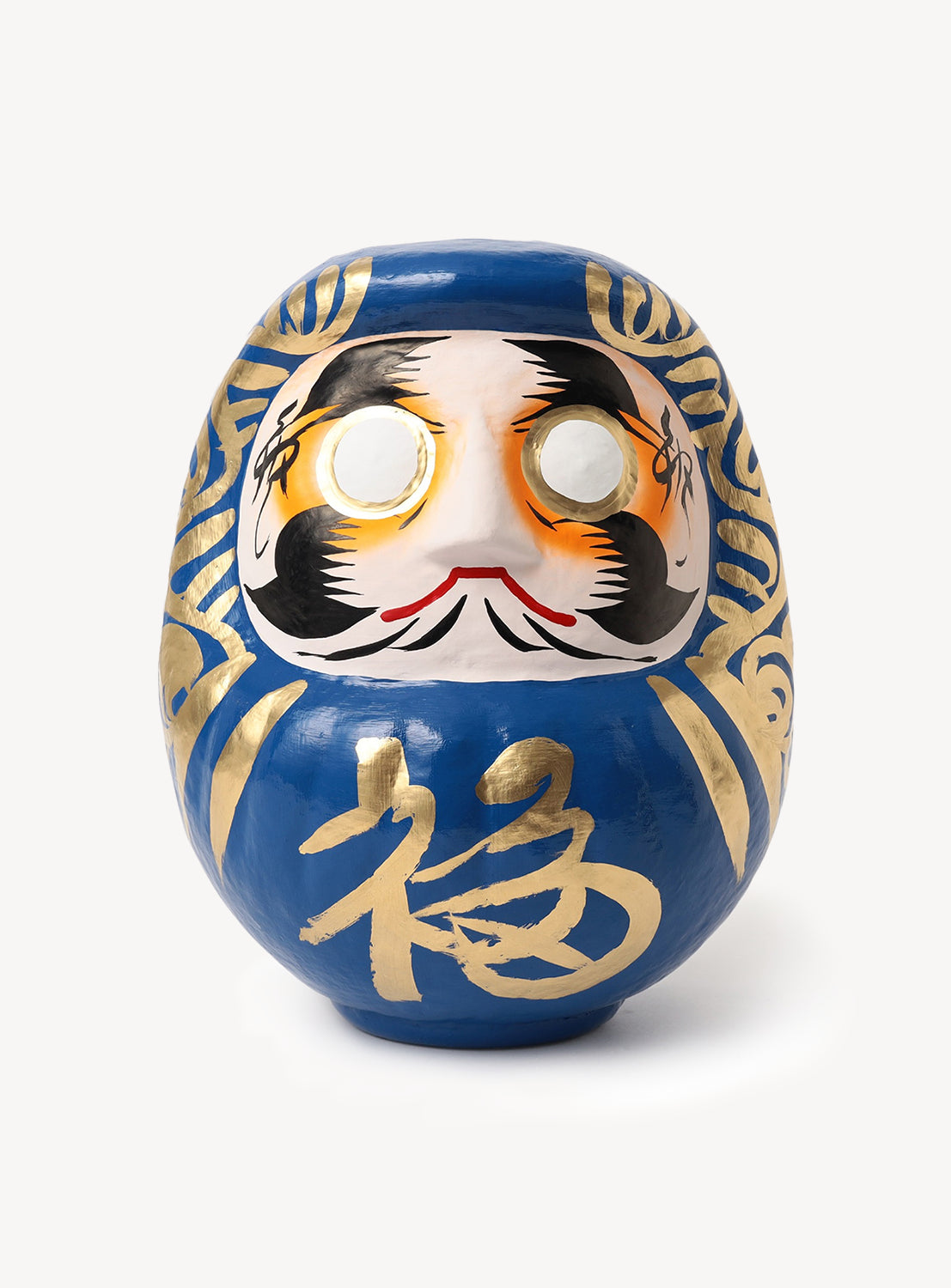 The [Exclusive] BEAMS JAPAN Large Shirakawa Daruma LA is a striking blue Daruma doll adorned with gold accents and blank white eyes, showcasing stylized facial hair and a gold kanji character on the front. This exquisite piece of Japanese craftsmanship is brought to you by BEAMS JAPAN as a special Los Angeles exclusive.
