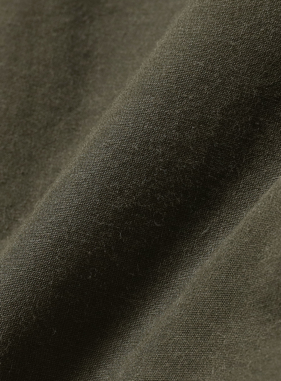 Olive green fabric, revealing a soft, textured weave.