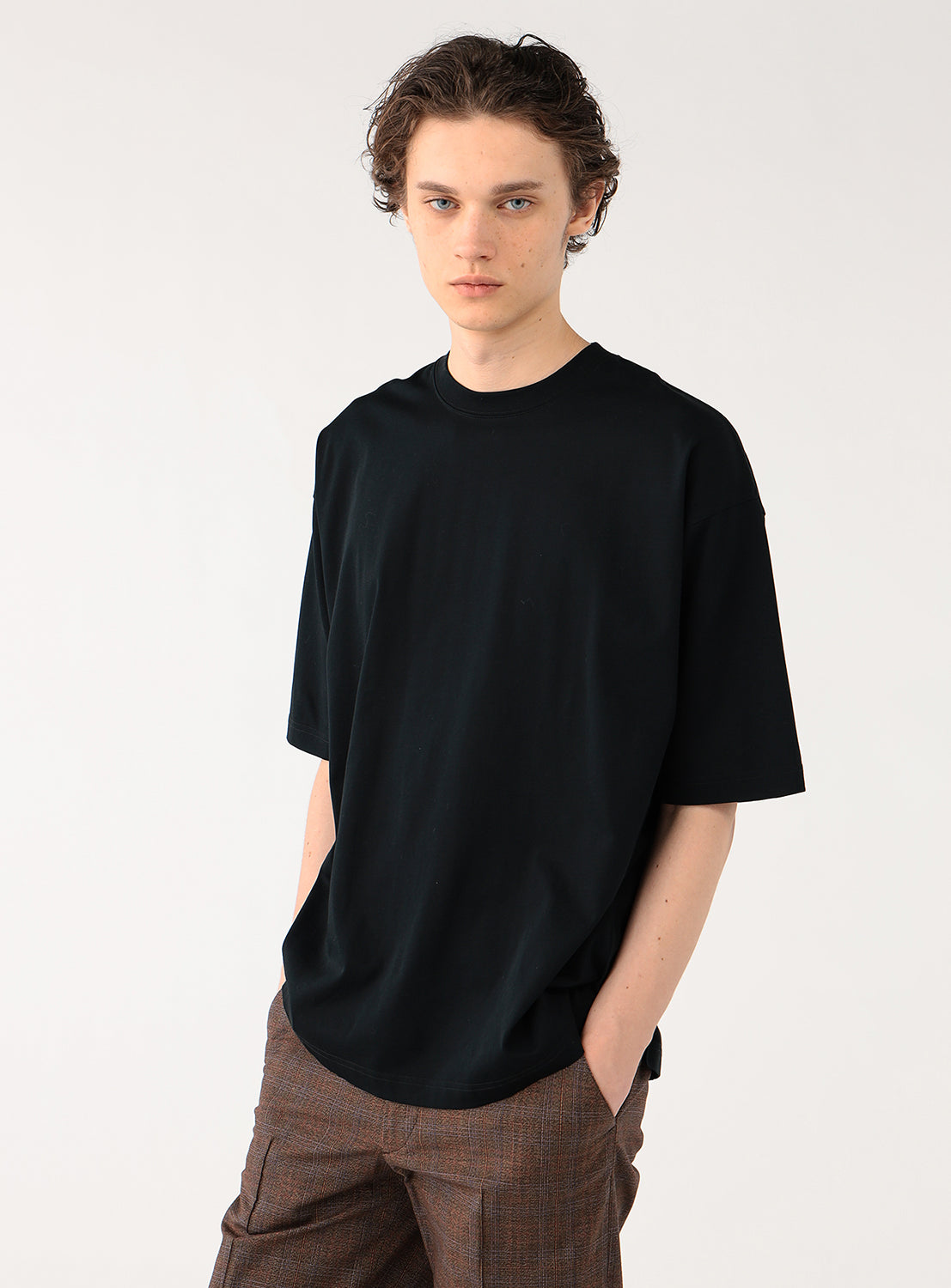 Model wearing black cotton t-shirt