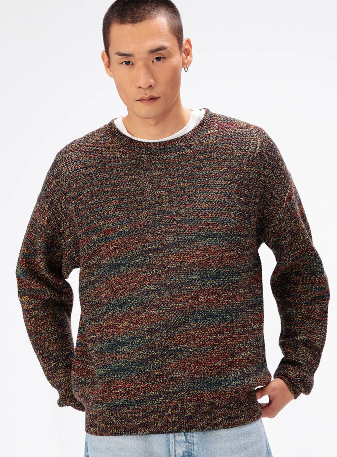 Multicolor space-dyed 7-gauge mesh crew neck top in a relaxed knit.