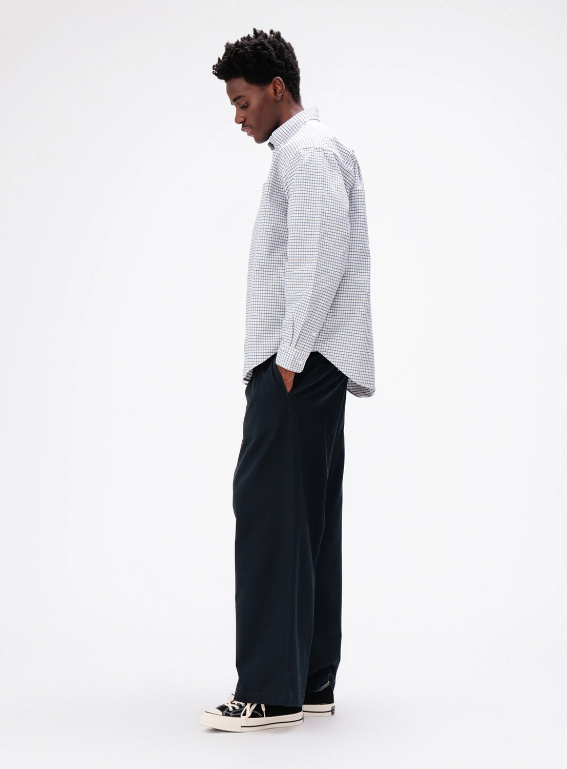 BEAMS New Wide Chino Pants in black, wide-leg fit with drawstring waist and canvas sneakers.