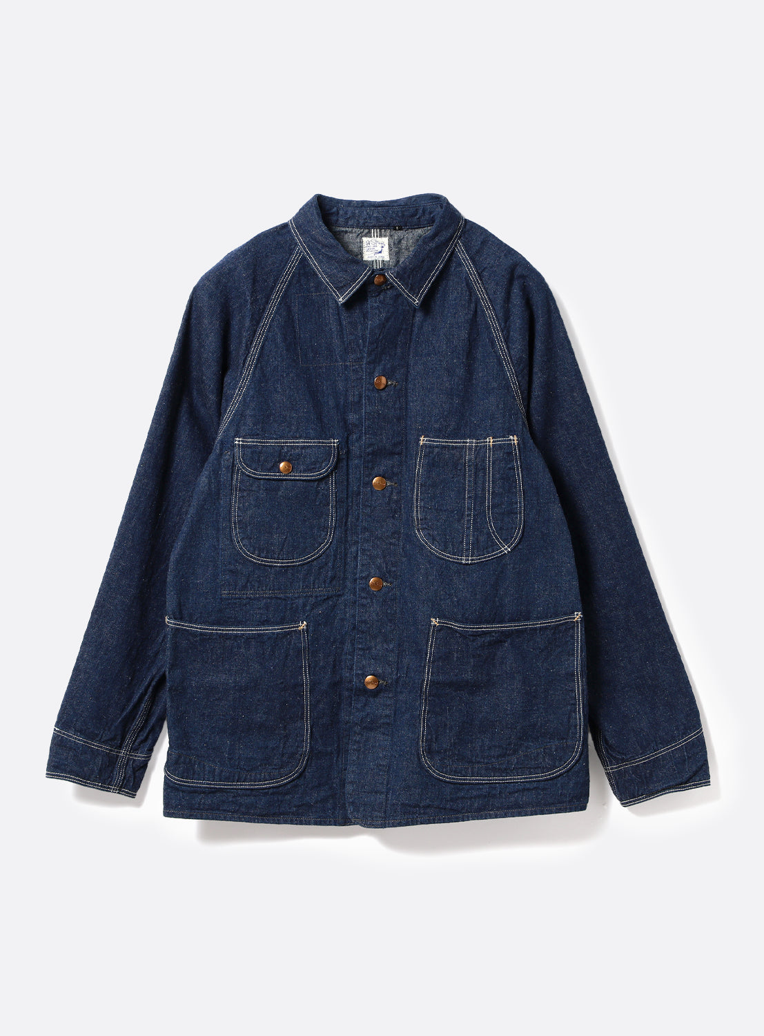 The orSlow 1950 Denim Coverall Jacket is crafted from lightweight blue denim and features classic workwear detailing, including a collar, brown buttons, and four front pockets—one of which is a buttoned chest pocket. Durable construction and contrasting white stitching provide an authentic coverall look.