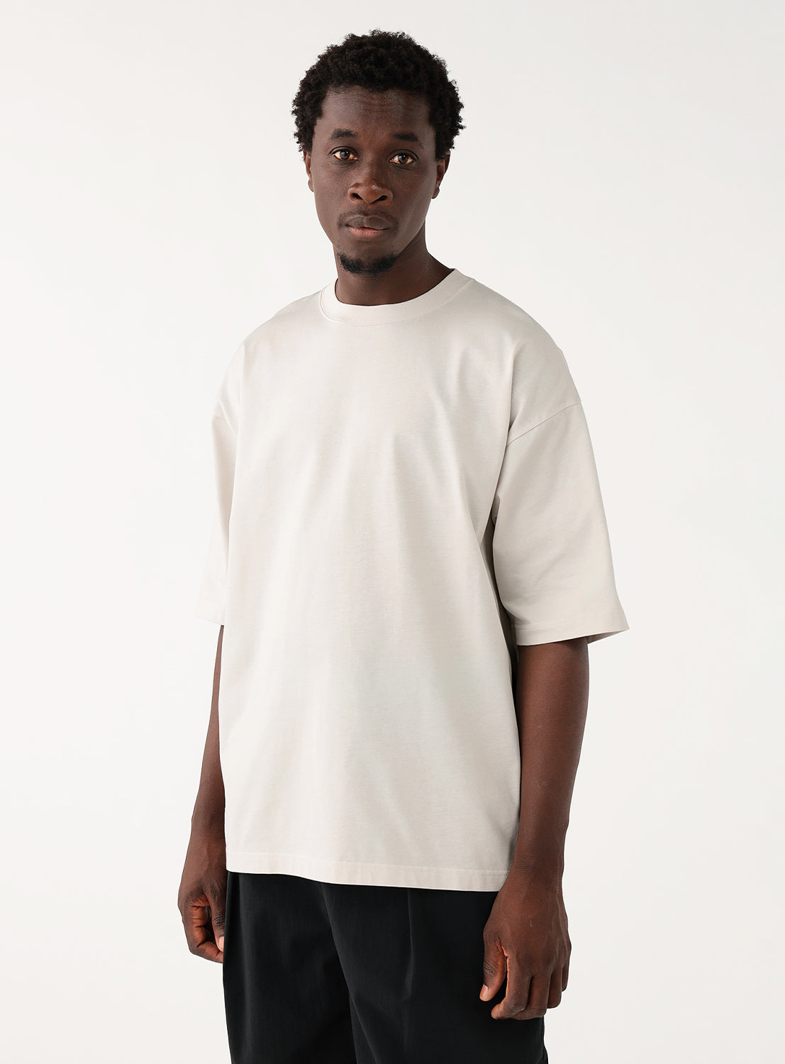 Model wearing white cotton tshirt