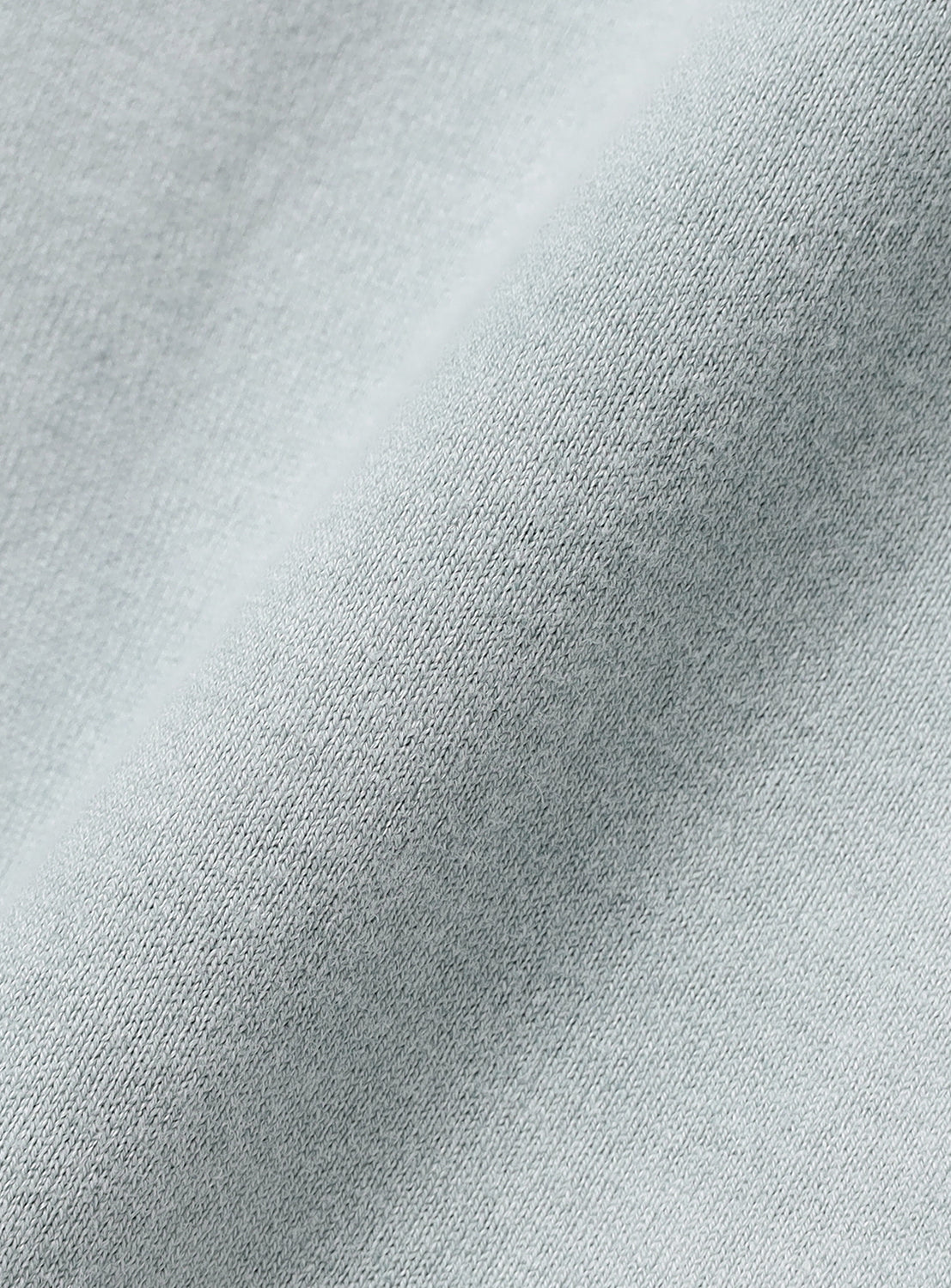 Close-up of stone gray fabric texture.