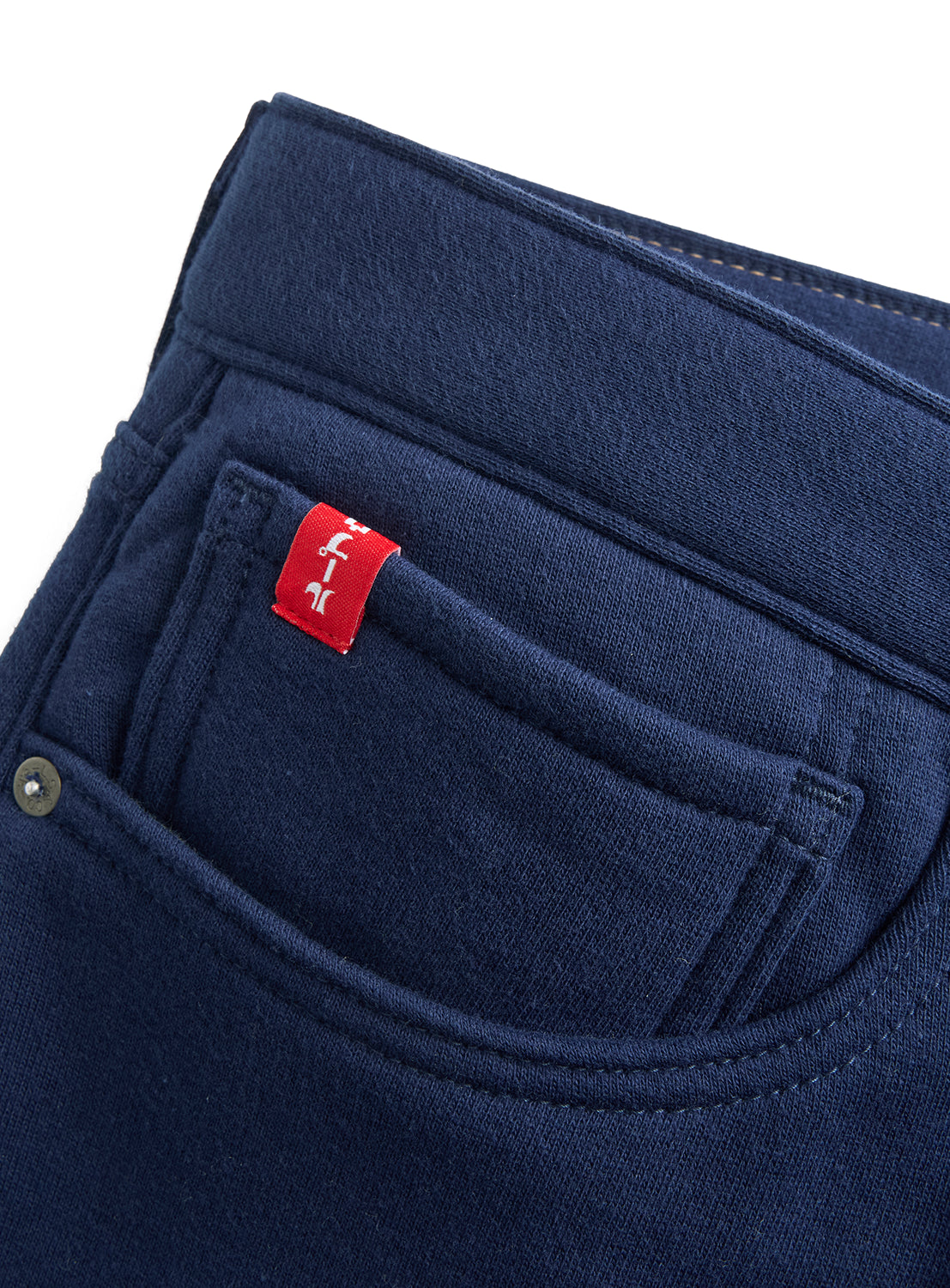 Dark blue Levi’s® x BEAMS x Loopwheeler Superwide pant pocket with red brand tab.