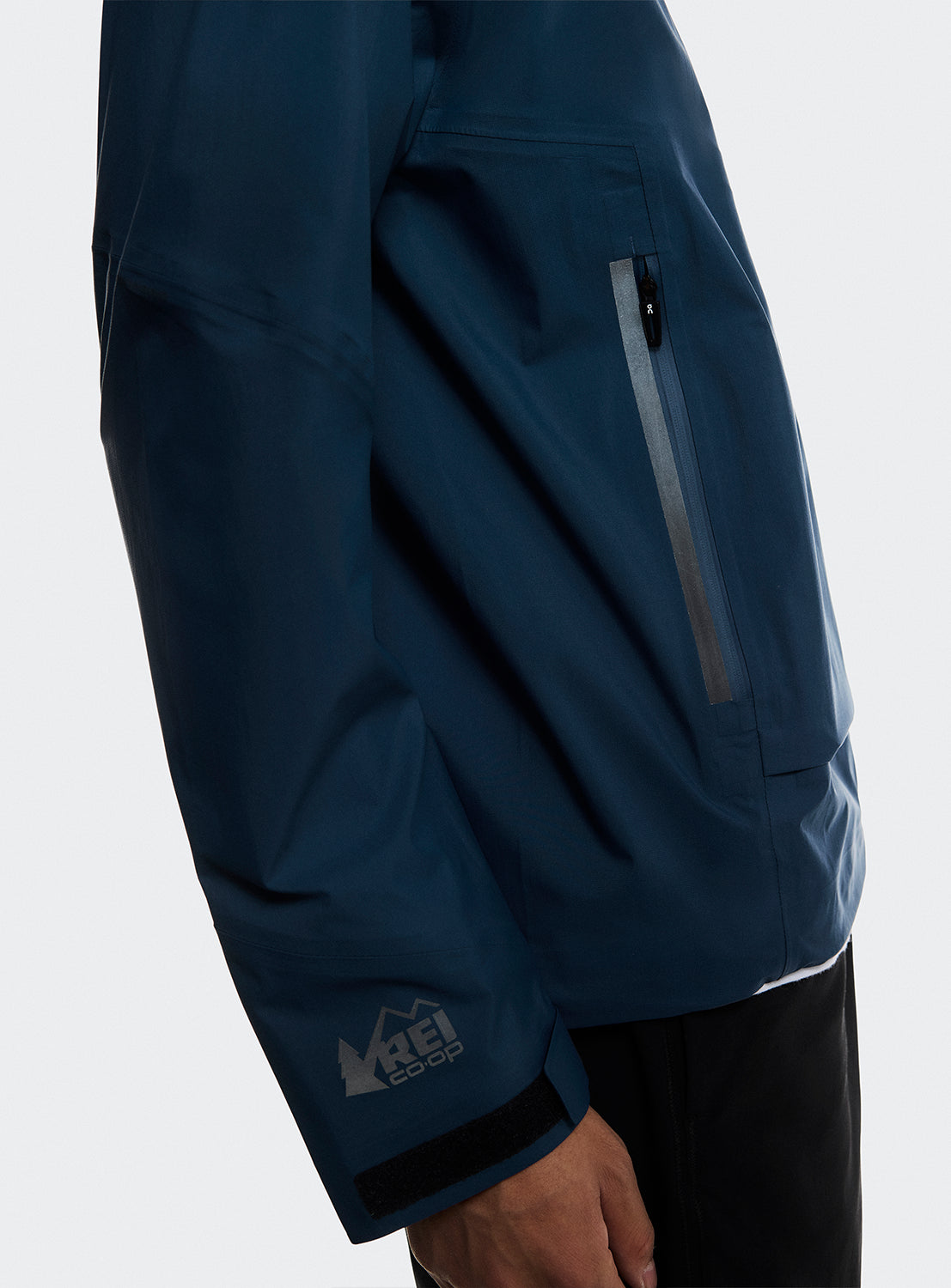 Close up side view of the sleeve and the side zipper. 