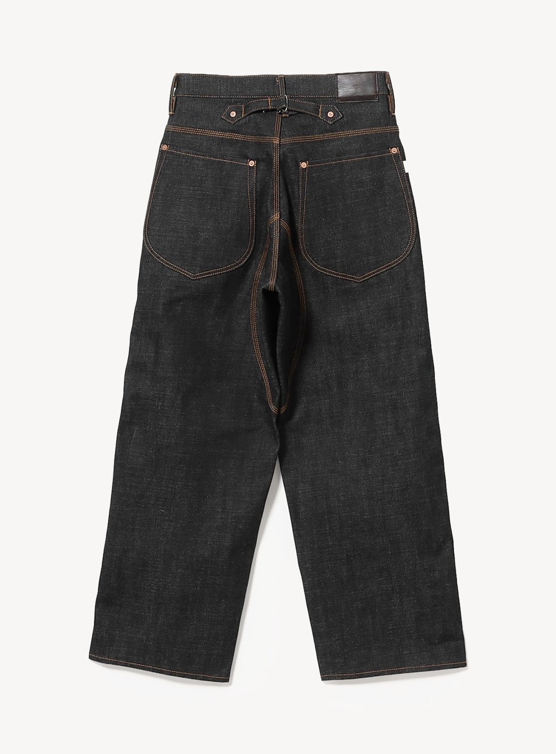 Back view of SUGARHILL's Classic Double Knee Denim Pants in dark indigo heavyweight denim, featuring contrast stitching, large rounded back pockets, and a brown leather patch on the waistband. Inspired by classic workwear, these jeans offer a wide-leg fit.