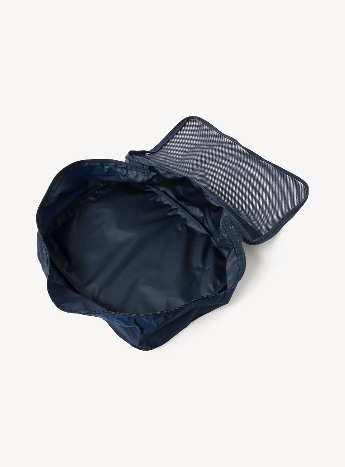 Navy blue travel bag with a clear window on a white background