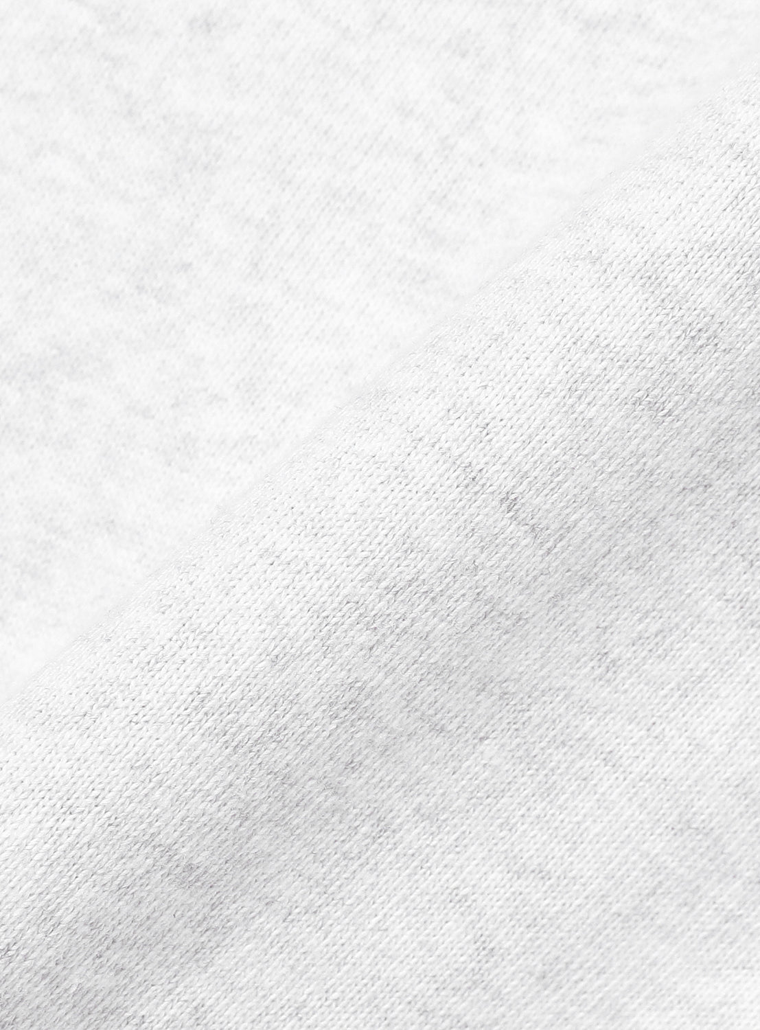 Extreme close-up of the soft ash grey cotton fabric, revealing its texture and quality.