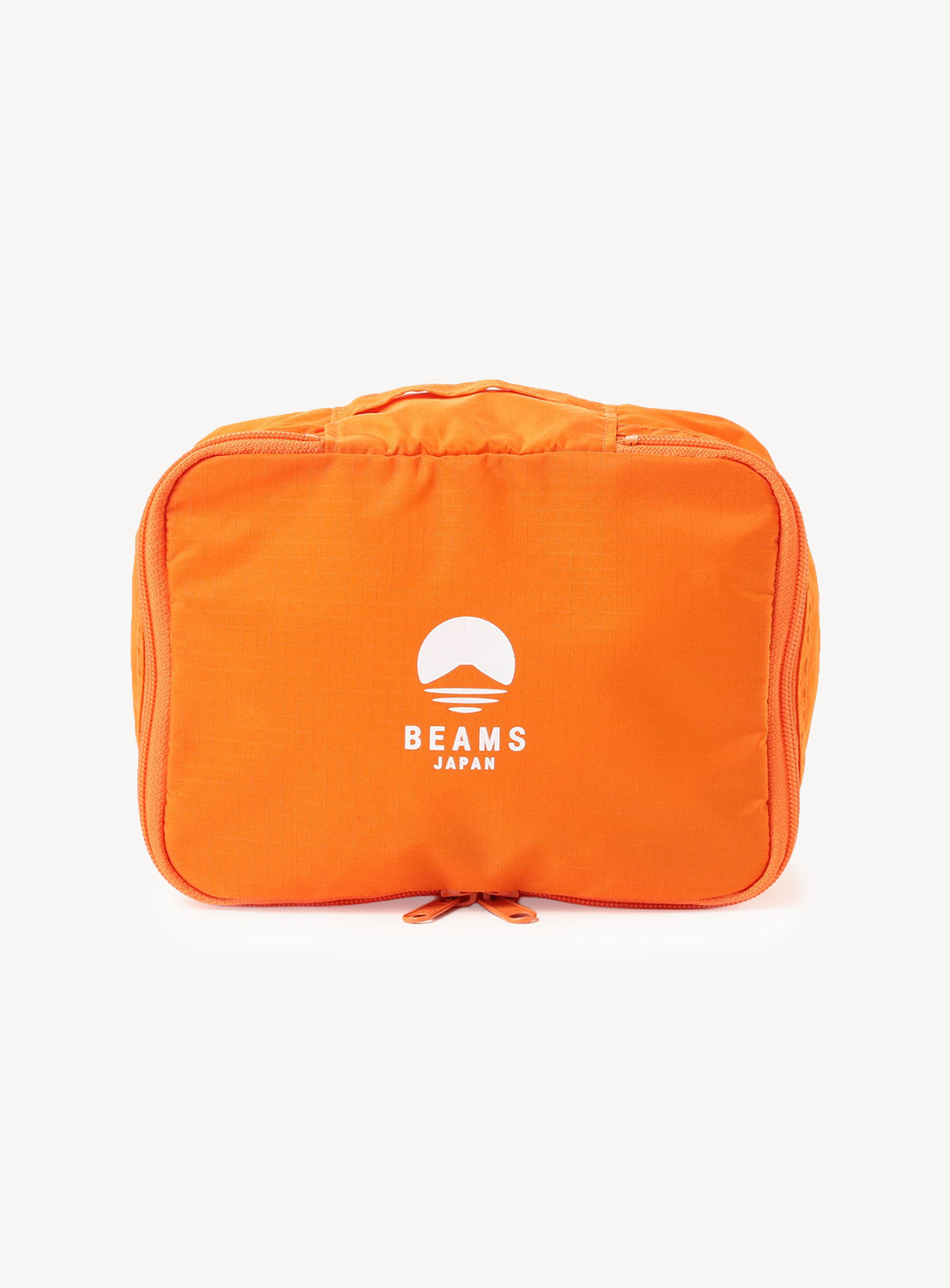 Orange packing cube with 'Beams Japan' logo on a white background