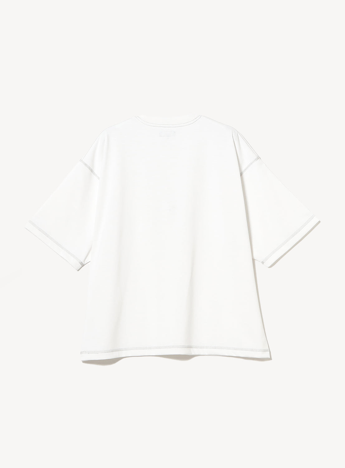 Back of white t-shirt with stitching details. 
