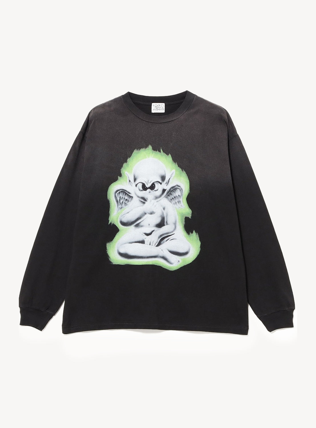 The F-LAGSTUF-F x RYOTA DAIMON Long Sleeve Tee is a black long-sleeve T-shirt featuring unique artwork by RYOTA DAIMON—a vintage-inspired graphic of a cartoonish white gargoyle with wings and a mischievous expression, sitting cross-legged and outlined in glowing green.